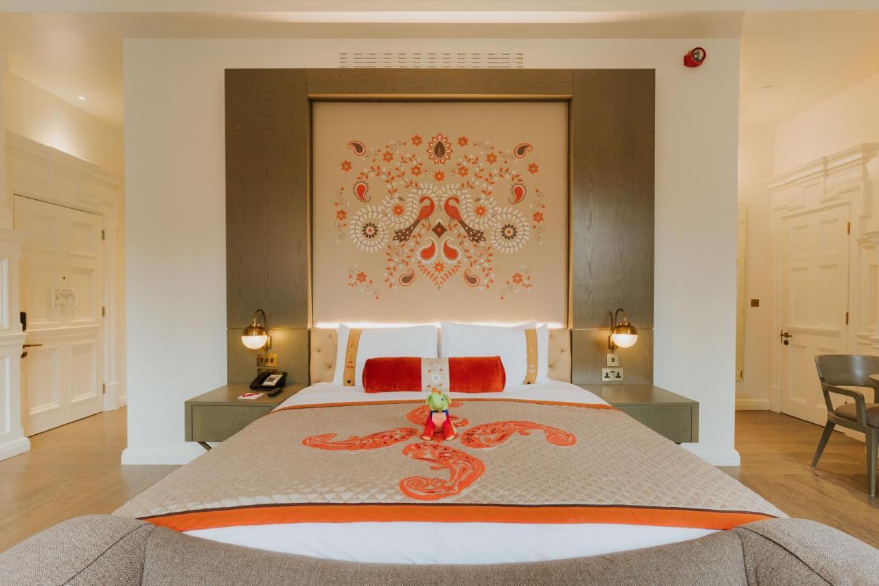 The Lalit London Londres Exterior foto A bedroom at the Taj Mahal Palace